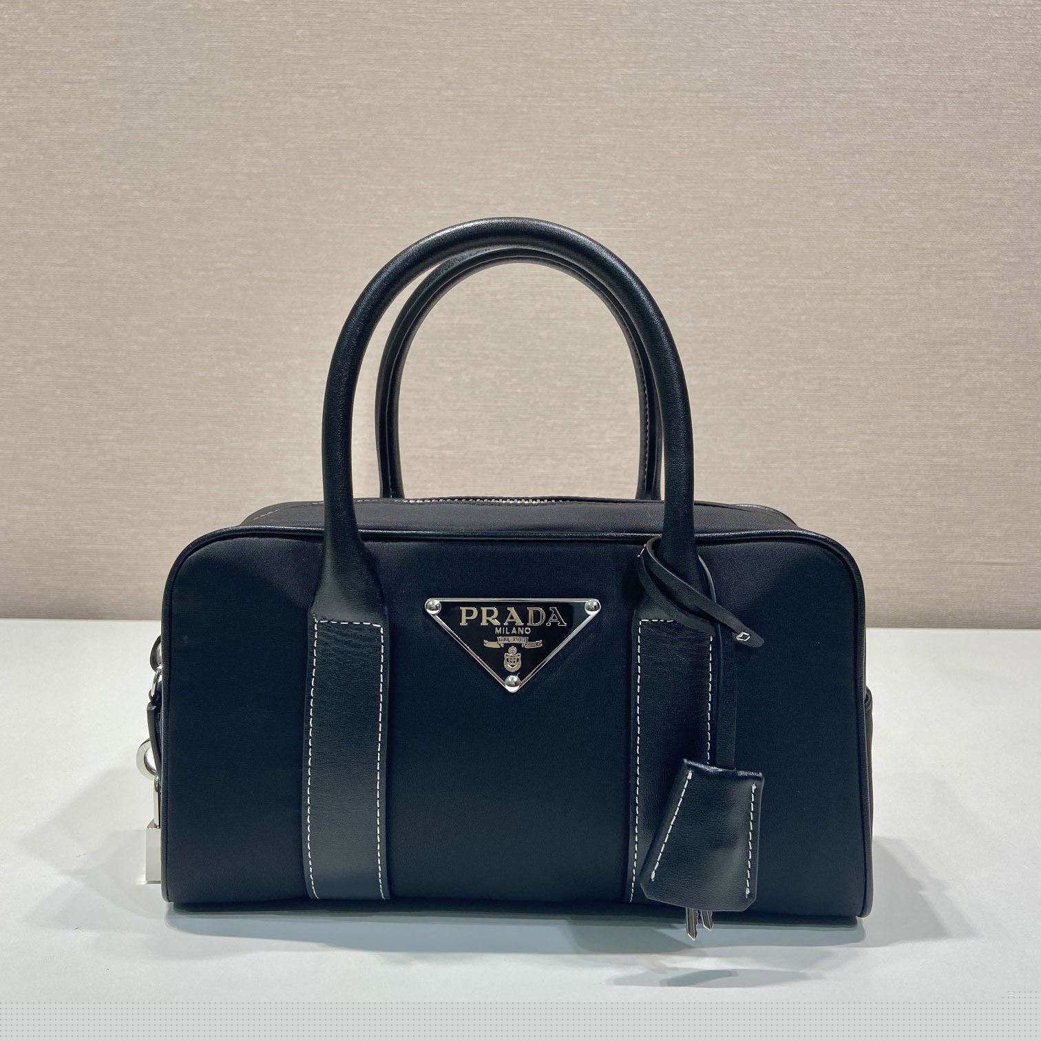 Pra*a top handle bags